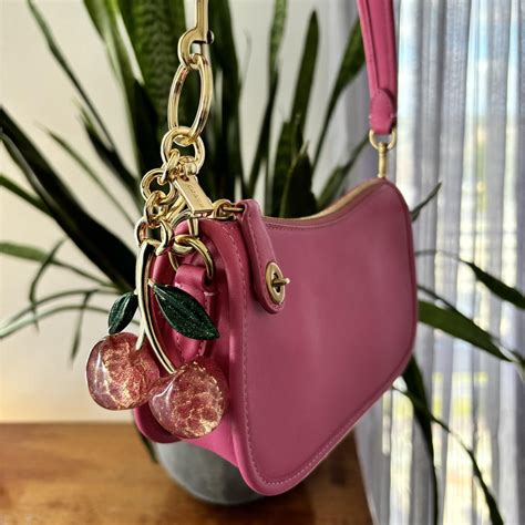 coach cherry bag dupe|cherry charm dupe review.